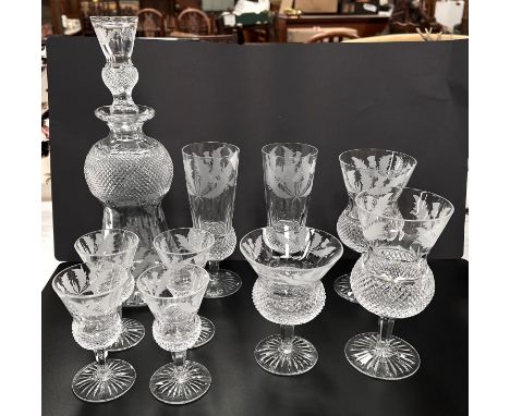 Edinburgh Crystal Thistle Design, a round decanter, 2 champagne flutes, 2 wines (small nick to rim), 1 red wine(nick to rim) 