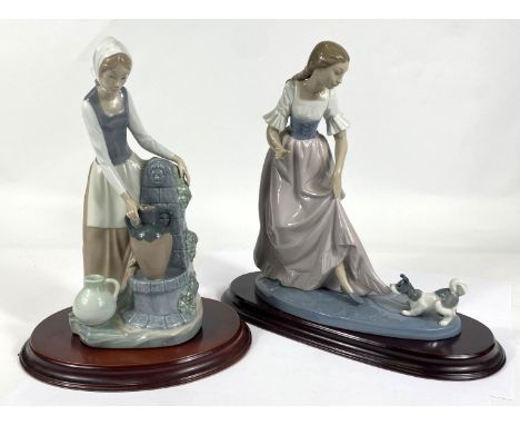 Two large Nao groups woman with dog biting skirt and woman collecting water 
