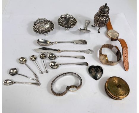 A hallmarked silver pair of salt and pepper pots; a hallmarked silver caddy spoon; various salts spoons; etc., various dates 