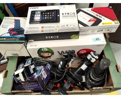 A Nintendo Wii Mario Kart edition console originally boxed, a Nintendo 3DS XL originally boxed and a selection of controllers