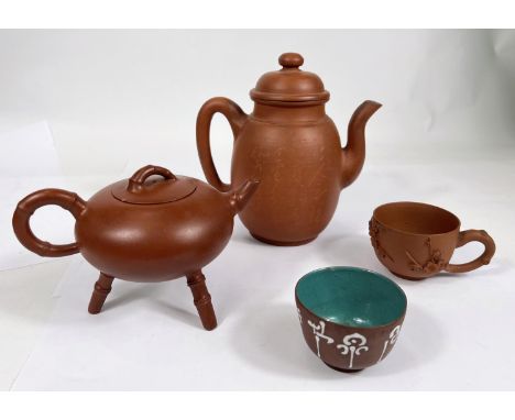 A Chinese Yi-Xing tea pot on three bamboo shaped legs, seal mark to the base, a larger Chinese Yi-Xing teapot with incised ch