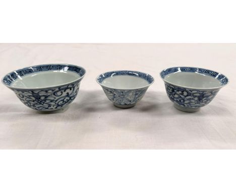 3 18th century Chinese blue and white tea/rice bowls 2 with similar patterns and seal marks to base 1 with floral decoration 