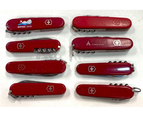 7 Swiss Army type pocket knives 