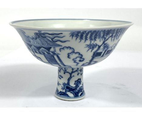 A large Chinese blue and white stem cup with traditional decoration, domestic scene trees plants etc, height 11.5cm, diameter