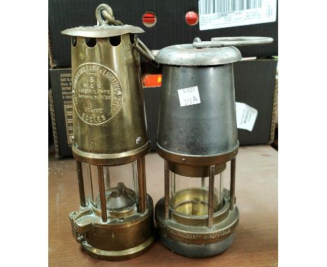 A 'The Protector' brass minors lamp makers lamp &amp; Lighting Co Eccles Manchester and another Wolf Safety lamp 