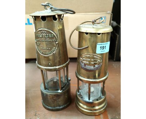 A 'The Protector' brass minors lamp makers lamp &amp; Lighting Co Eccles Manchester and another Ferndale Coal Mining lamp 