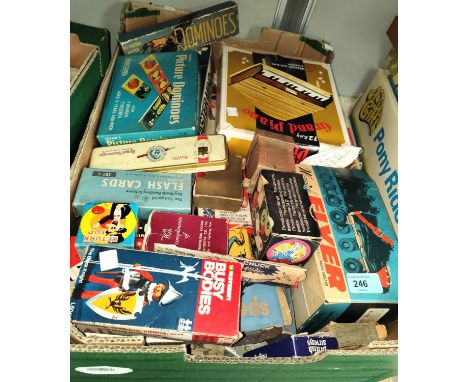 Two sets of vintage roller-skates; a selection of 1960's/70's children's card and other games, mostly in original boxes (not 