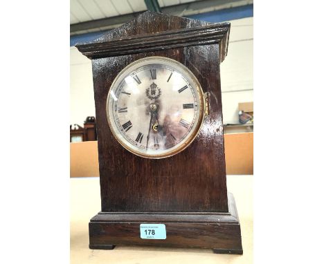 An RAF 'Officers Mess'  oak cased clock made by W. Elliott Ltd. No.3873 with circular silvered dial RAF insignia, with pendul