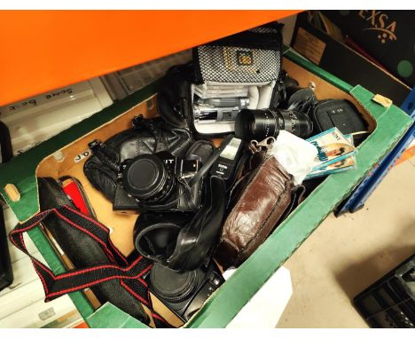 A selection of vintage camera equipment vintage SLR cameras, lenses, projector and screen etc