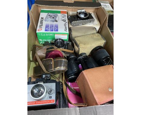 A selection of various vintage cameras; lenses; binoculars; etc. 