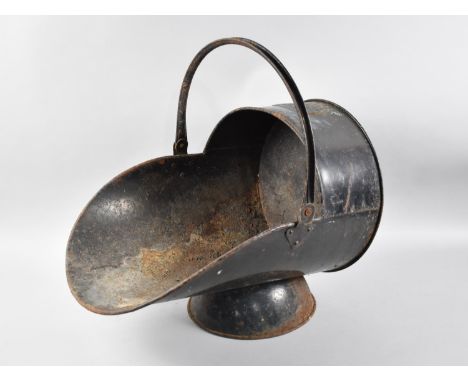 A Vintage Black Painted Metal Helmet Shaped Coal Scuttle with War Department Stamp, 46cms Long 