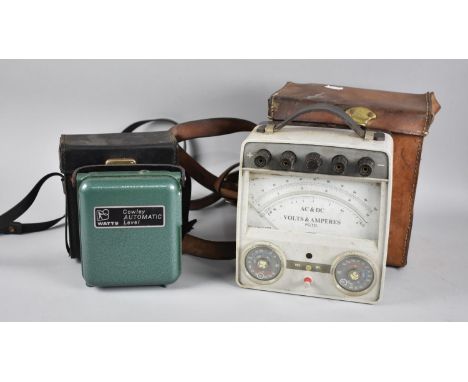 A Vintage Leather Cased Volt and Amp Meter Together with a Cased Cowley Level 