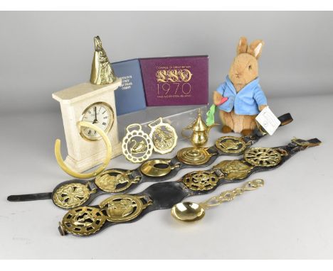 A Collection of Various Horse Brass, Churchill Mantle Clock, Beatrix Potter Peter Rabbit Soft Toy, Coin Sets etc 