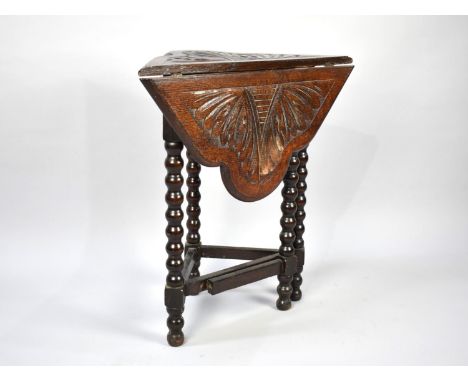 A Late Victorian/Edwardian Drop Leaf Oak Occasional Table with Carved Top and Bobbin Tripod Supports, 68cm Wide 