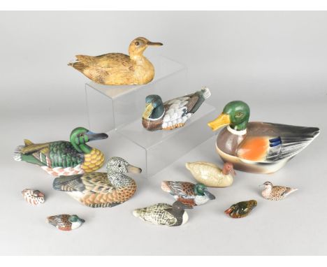 A Collection of Various Wooden and Ceramic Ducks 