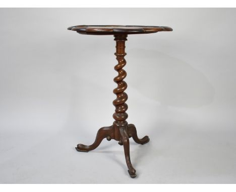 A William IV Rosewood Tripod Table with Barley Twist Supports, 53cm Diameter and 71cm High 