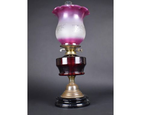A Late Victorian Brass Based Oil Lamp with Ruby Glass Reservoir and Later Coloured and Etched Shade, In need of Some attentio