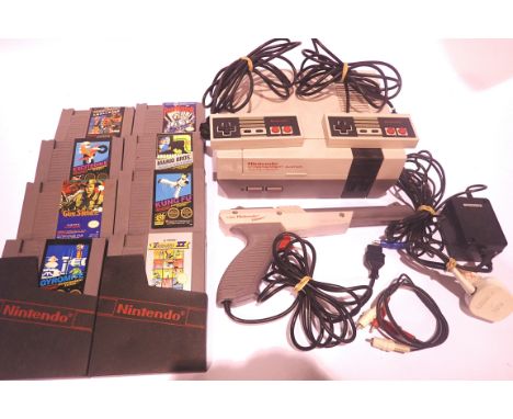 Retro Nintendo Entertainment System Mattel version, two controls, one pistol and nice games. P&amp;P Group 3 (£25+VAT for the
