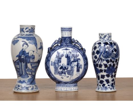 Three blue and white porcelain piecesChinese, 19th Centuryincluding a moon flask with Kangxi mark, 20.6cm high and two vases,