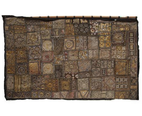 Embroidered wall hanging Indian, Kutch, 20th Centuryon patchwork ground, with silk, gold and silver threads with small mirror