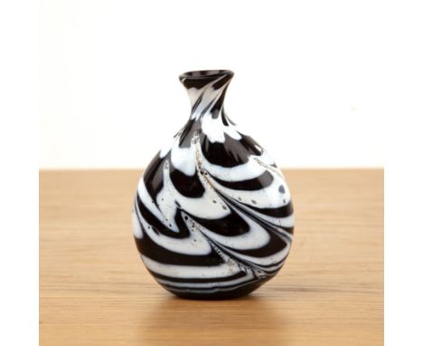 Marvered glass flask,Egypt or Syria,17th Century or laterpossibly Avyuvid or Mamluk, translucent dark brown blown glass, of o