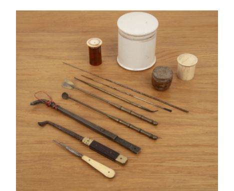 Four various opium containersChinese, late 19th Centuryhorn, earthenware, porcelain and bone and an opium paktong tool set
