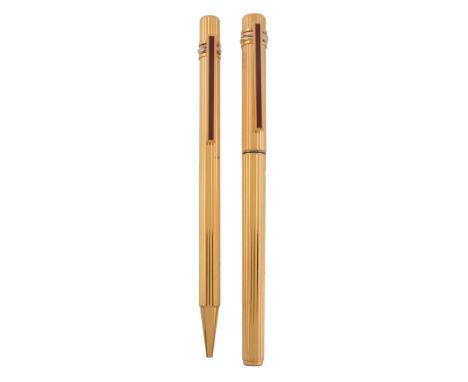 Cartier, a rolled gold fountain pen, no. 565736   Cartier, a rolled gold fountain pen,   no. 565736, the cap and barrel with 