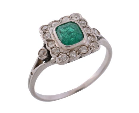 An early 20th century diamond and emerald cluster ring , circa 1910   An early 20th century diamond and emerald cluster ring 