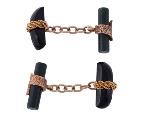 A pair of hardstone cufflinks, each cufflink with a shaped polished onyx...   A pair of hardstone cufflinks,   each cufflink 