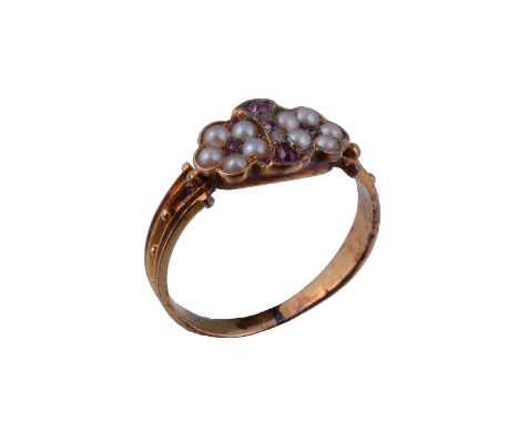A Victorian ruby and half pearl ring, circa 1870   A Victorian ruby and half pearl ring,   circa 1870, composed of two flower