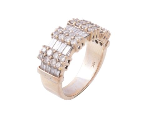 A diamond dress ring, the broad panel with rows of baguette cut diamonds...   A diamond dress ring,   the broad panel with ro