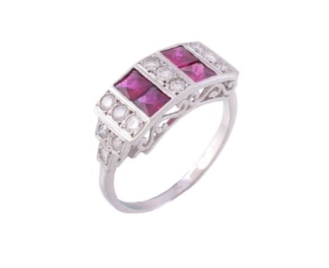 A ruby and diamond ring, the rectangular shaped panel set with calibre cut...   A ruby and diamond ring,   the rectangular sh
