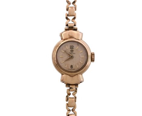 Omega, ref. 5635, a 9 carat gold bracelet wristwatch, no   Omega, ref. 5635, a 9 carat gold bracelet wristwatch,   no. 959, h