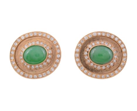 A pair of jadeite and diamond earrings, the oval shaped panels set with a...   A pair of jadeite and diamond earrings,   the 