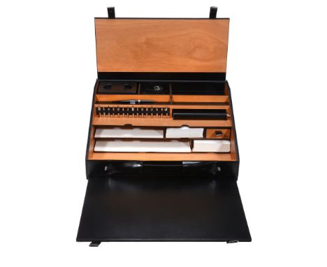 Pineider, Collezione 1949, a leather travel writing desk   Pineider, Collezione 1949, a leather travel writing desk,   the fl