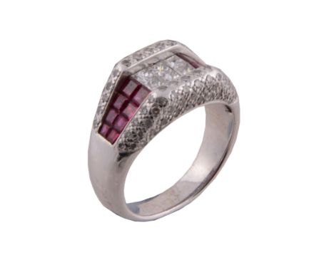 A ruby and diamond ring, the panel set with square cut diamonds between...   A ruby and diamond ring,   the panel set with sq