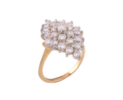 An 18 carat gold diamond ring, the marquise shaped panel set with brilliant...   An 18 carat gold diamond ring,   the marquis