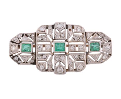 An Art Deco diamond and emerald brooch , circa 1930   An Art Deco diamond and emerald brooch  , circa 1930, the pierced shape