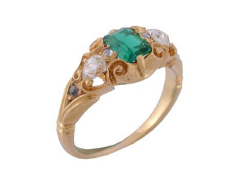 A mid Victorian emerald and diamond ring , circa 1860   A mid Victorian emerald and diamond ring  , circa 1860, the central s