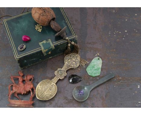 A jadeite jade green panel, a nephrite spoon, a bone  Middle Eastern chessman knight, loose gems, carved walnut and other ite