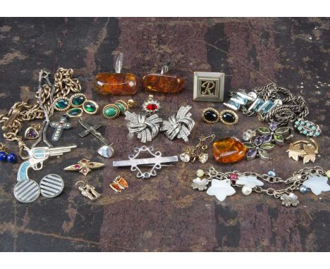 A pair of amber and chrome plated cufflinks, together with a pistol and turquoise pin badge, a garnet and seed pearl cross, v