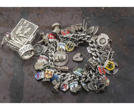 A collection of silver jewellery, including a multi set charm bracelet, mostly comprising silver and enamel Continental city 