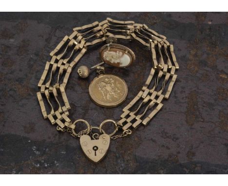A 9ct gold gate link bracelet, having a heart shaped padlock clasp, a single shell cameo earring, a St Christopher pendant an