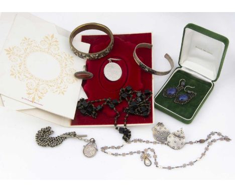 A collection of costume jewellery, including a mother of pearl necklace, a base metal bangle, pair of lapis and silver filigr