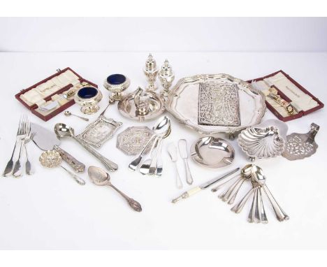 A collection of silver and silver plate, including a silver cake slice and a silver Punch magazine commemorative panel, along