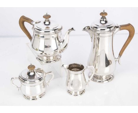 A 1960s silver four piece silver tea set by Wakely & Wheeler, comprising nice gauge and good quality hot water pot, teapot, m