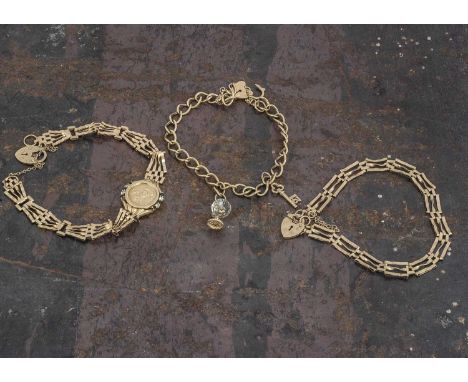 Three 9ct gold bracelets, comprising a curb link charm bracelet with padlock clasp having two charms, a three bar gate link b