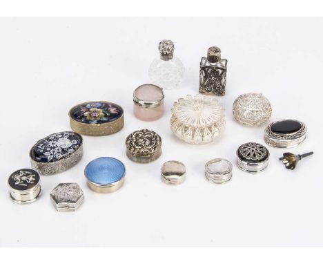 A group of small silver and other boxes and two scent bottles, one silver box with blue enamel lid, another rose quartz with 