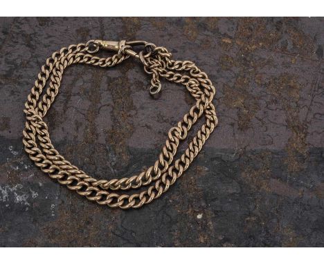 An Edwardian 15ct gold curb linked double bracelet, converted from a watch chain, marked to panel 15, 25g