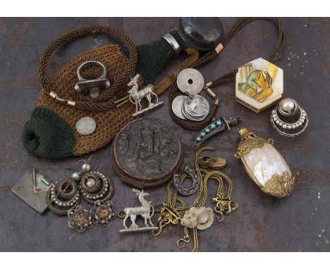 A collection of miscellaneous items,  including a plaited hair necklace, gilt metal fob a cartridge ring attachment